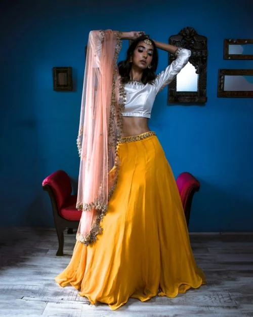 Bollywood hen party dance class in Nottingham, group mid-routine in colourful formation
