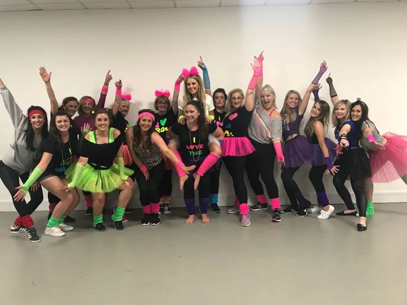 Fame hen party dance class in Nottingham, 80s stage-school group mid-routine